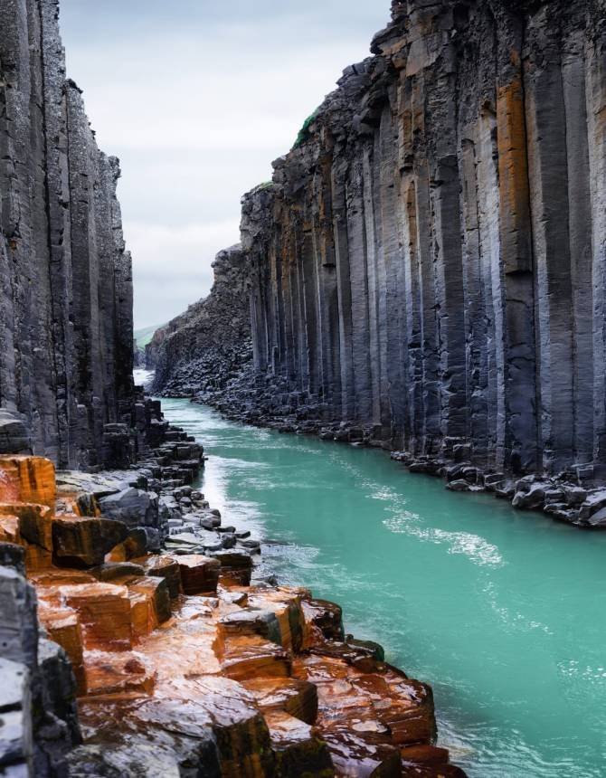 Studlagil basalt canyon in Iceland. Most famous and popular place in Iceland. Studlagil basalt canyon in Iceland. Most famous and popular place in Iceland.